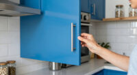They Transformed Their Dated Kitchen Into A Chic, Blue Cabinet Oasis